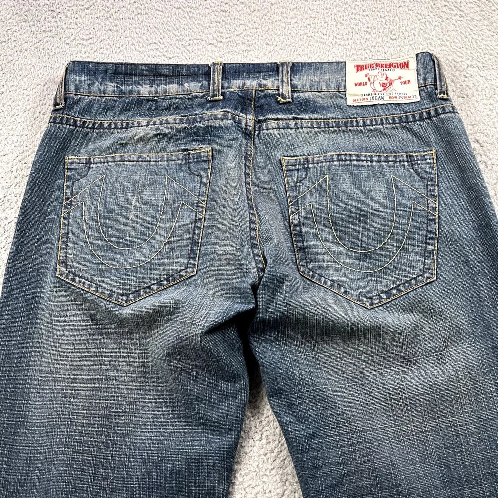 True Religion Logan Jeans Men 38 Blue Button Fly Distressed Split Hem‎ Whiskers